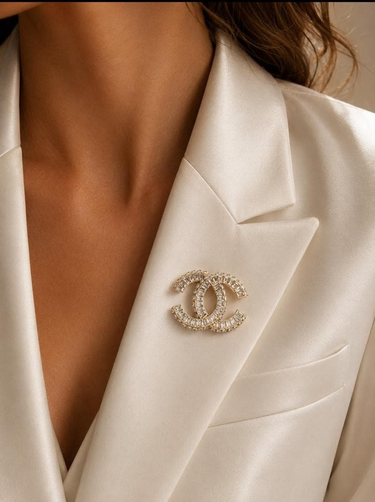 Broche Ch*nel